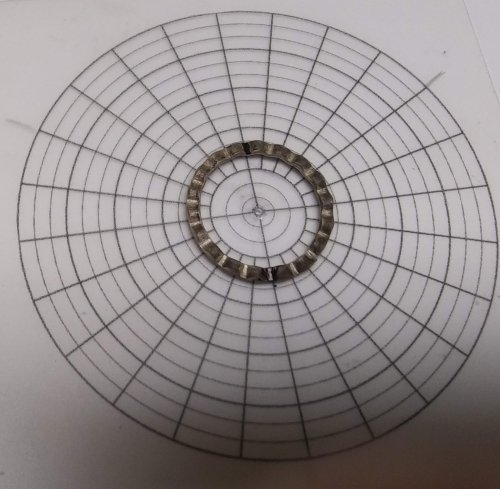 Judy Larson's Mike's Surpirise Claire's Ripple Pendant - , Contemporary Wire Jewelry, Jump Rings, Jump Ring, Making Jump Rings, Butane Torch, Soldering, Solder, It may be easier to place the plier jaws in the center 